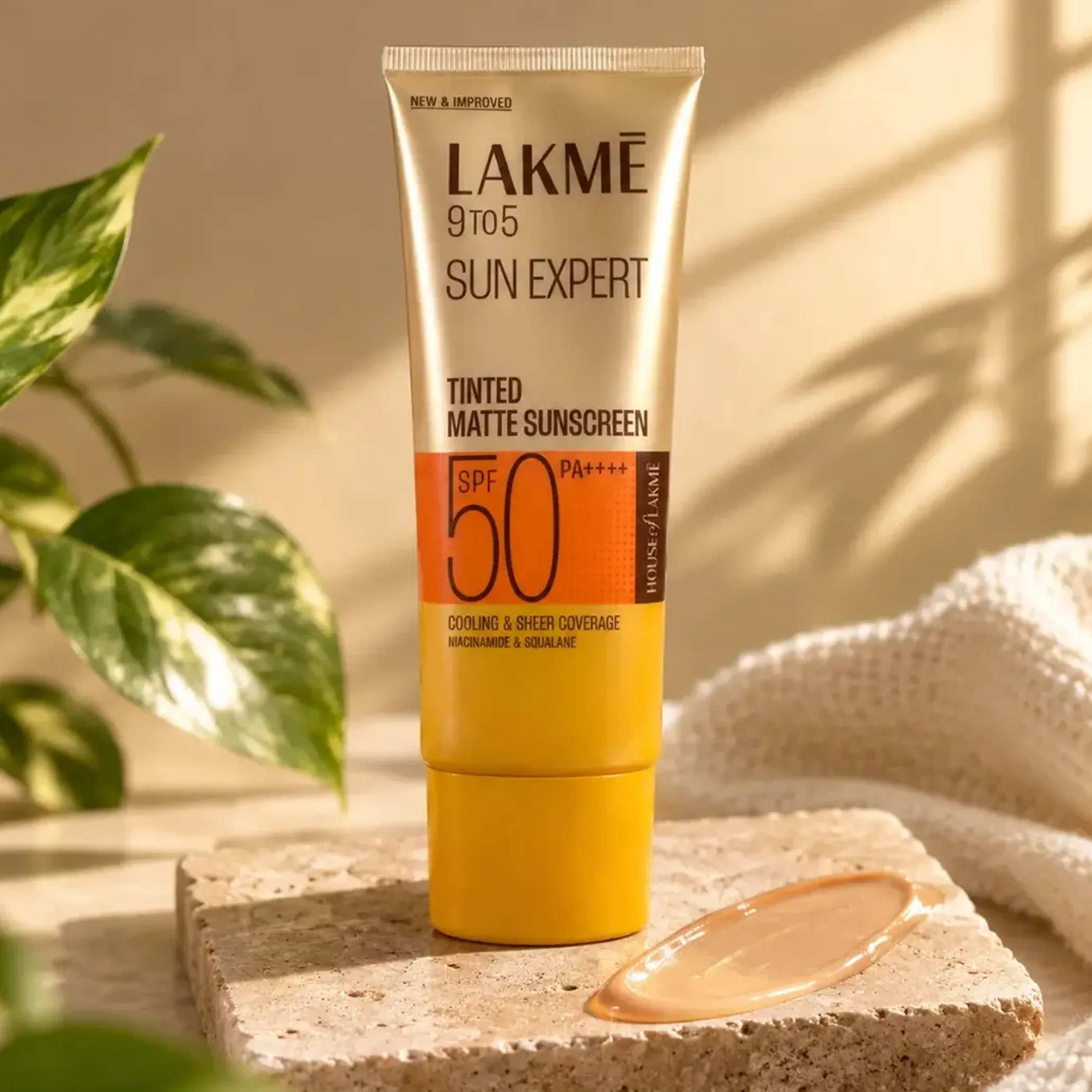 spf 50 sunscreen bottle on white background