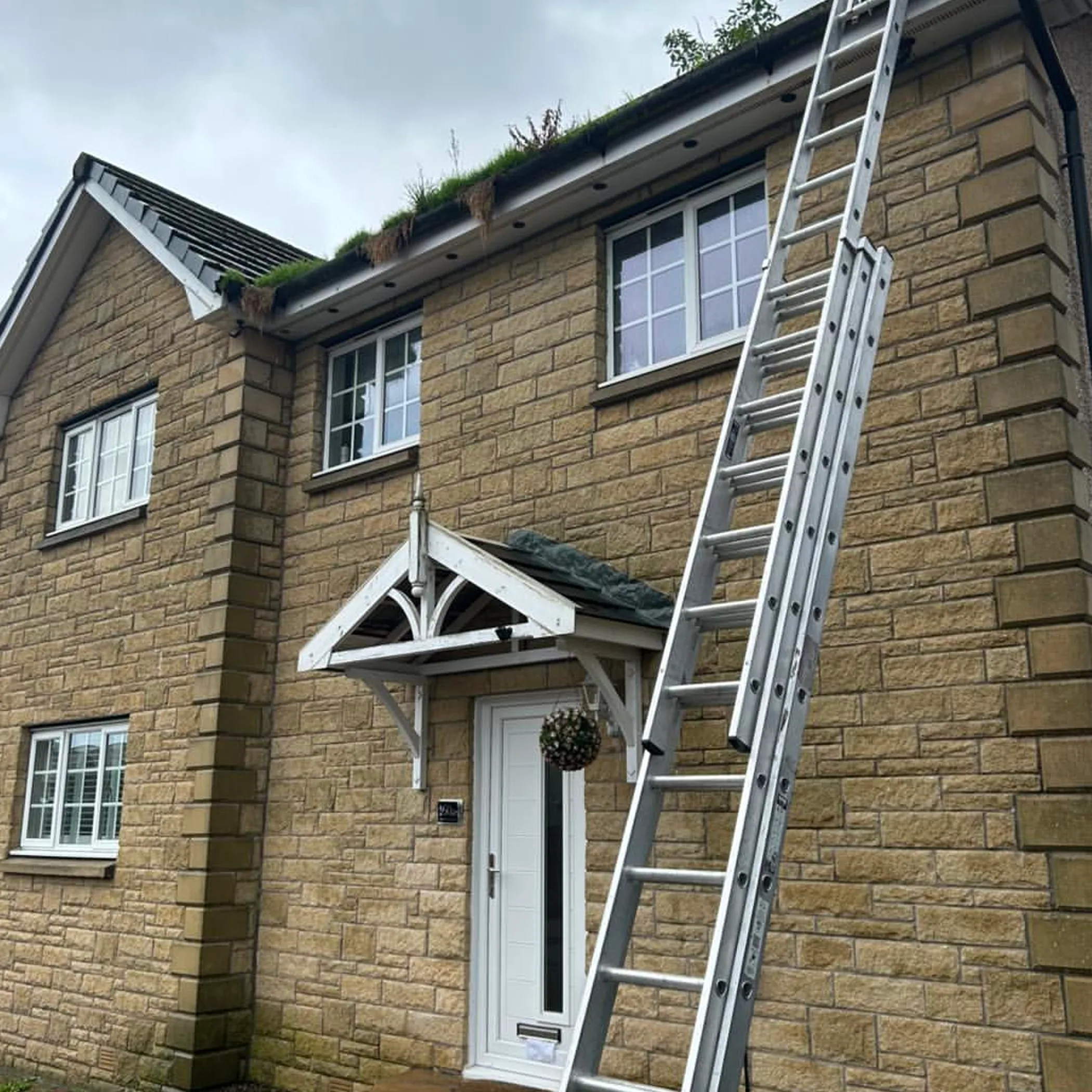 roof gutters and ladder during upkeep